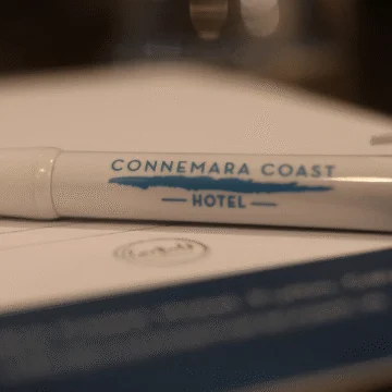 Black pen with "Connemara Coast Hotel" in gold lettering, against a white background.