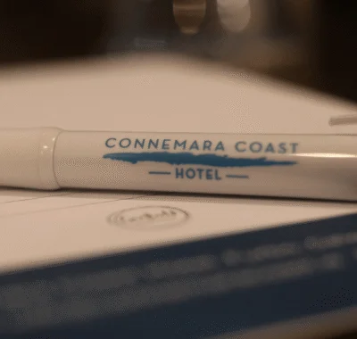 Black pen with "Connemara Coast Hotel" in gold lettering, against a white background.